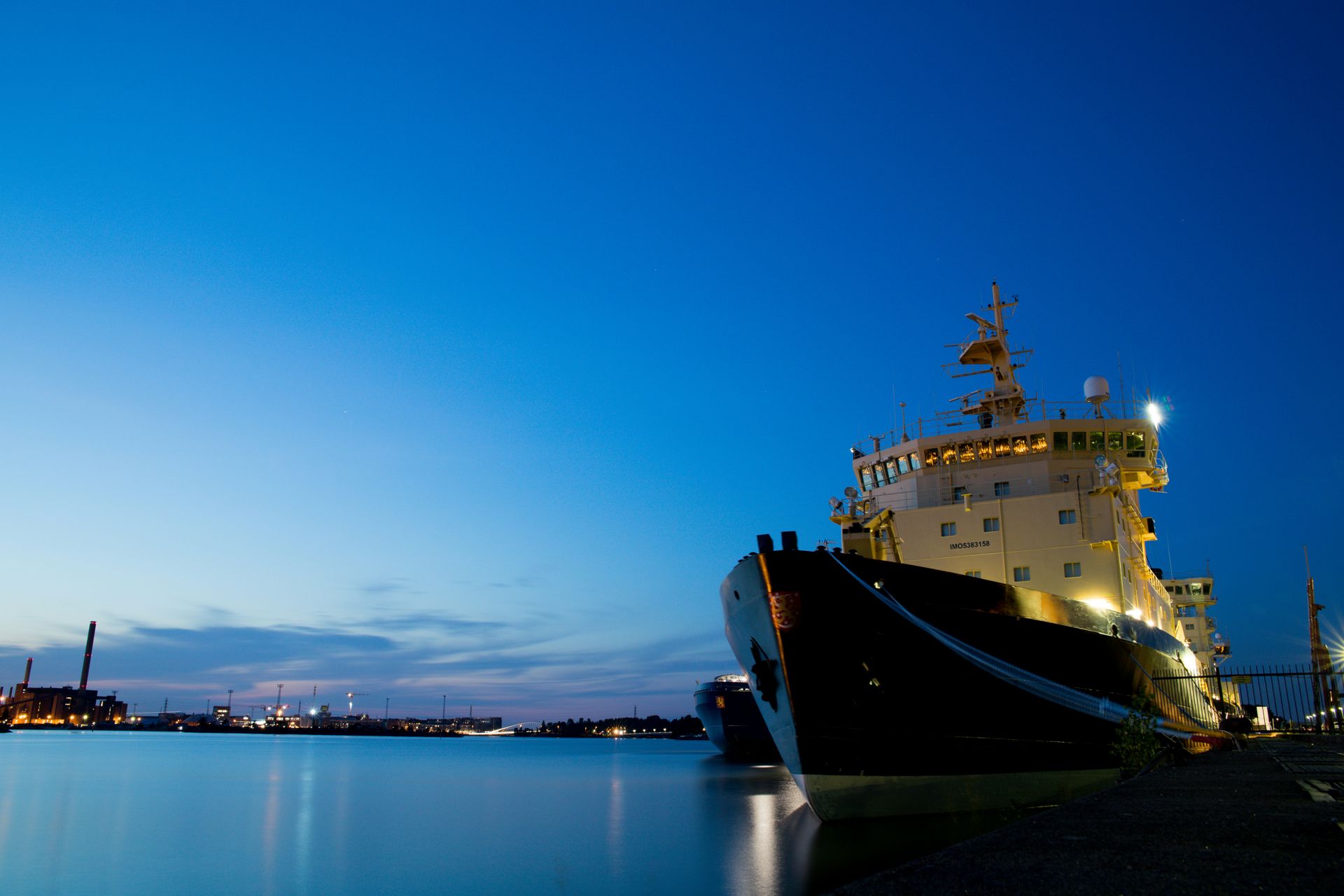 Vessel alongside at night in port